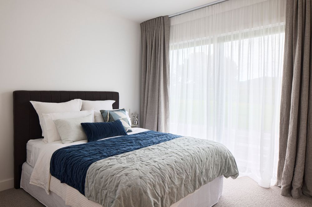 Located at one end of the home, the guest suite can be closed off to allow for privacy.