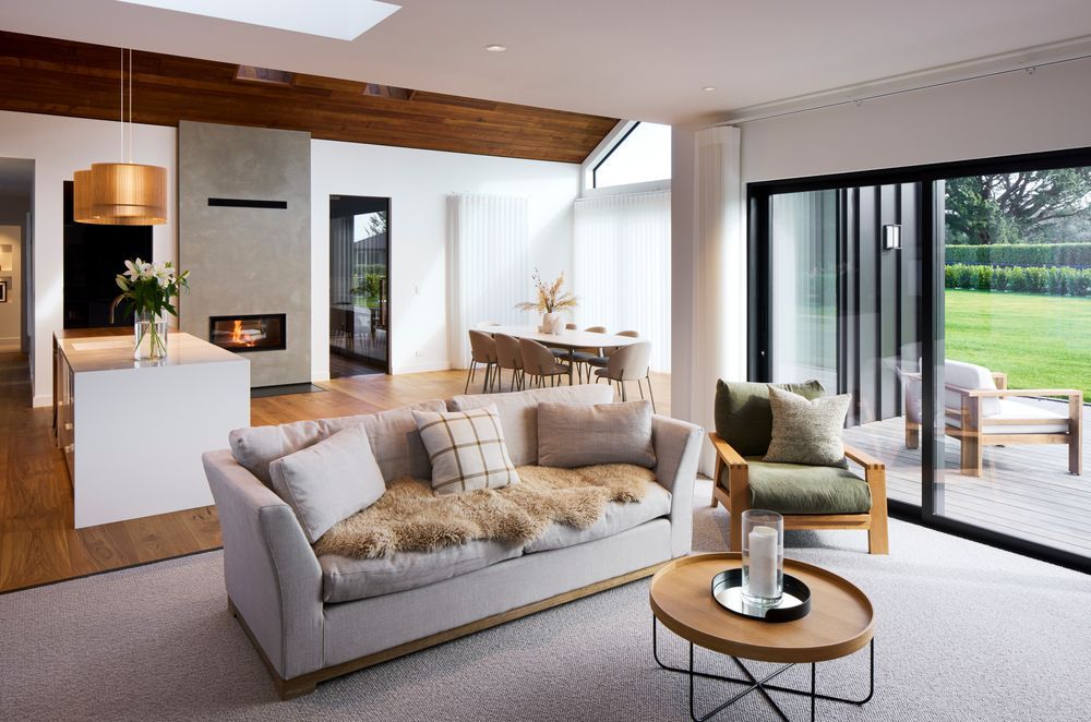 The living area is bright and welcoming, with a lower ceiling height to create a sense of comfort and warmth.