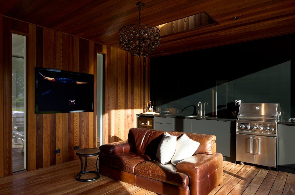 Complete with a chandelier, fireplace, television and barbecue, this is the Ferguson's favourite room in the house.