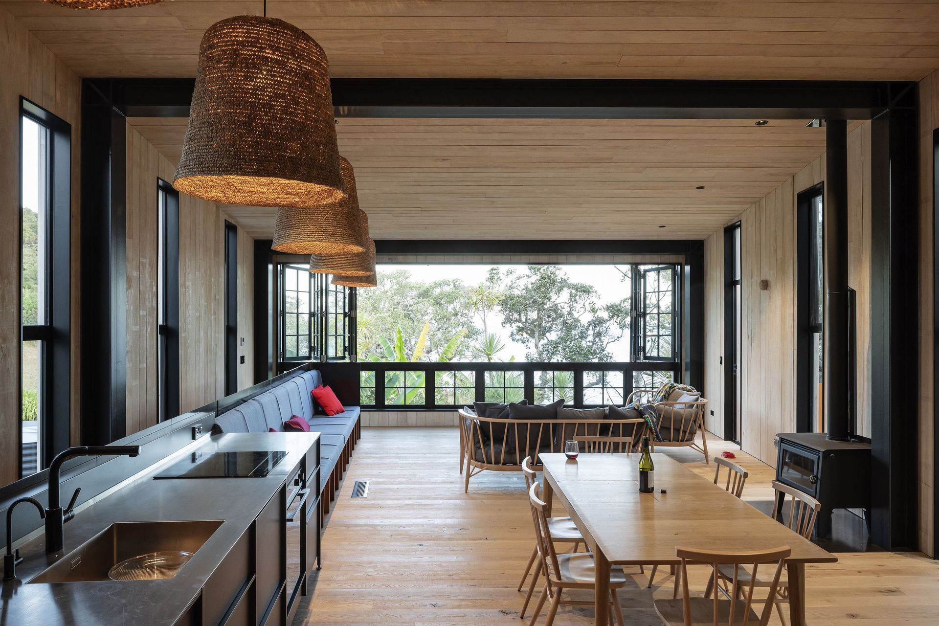 The home is entirely clad in cedar, which extends to the interior.
