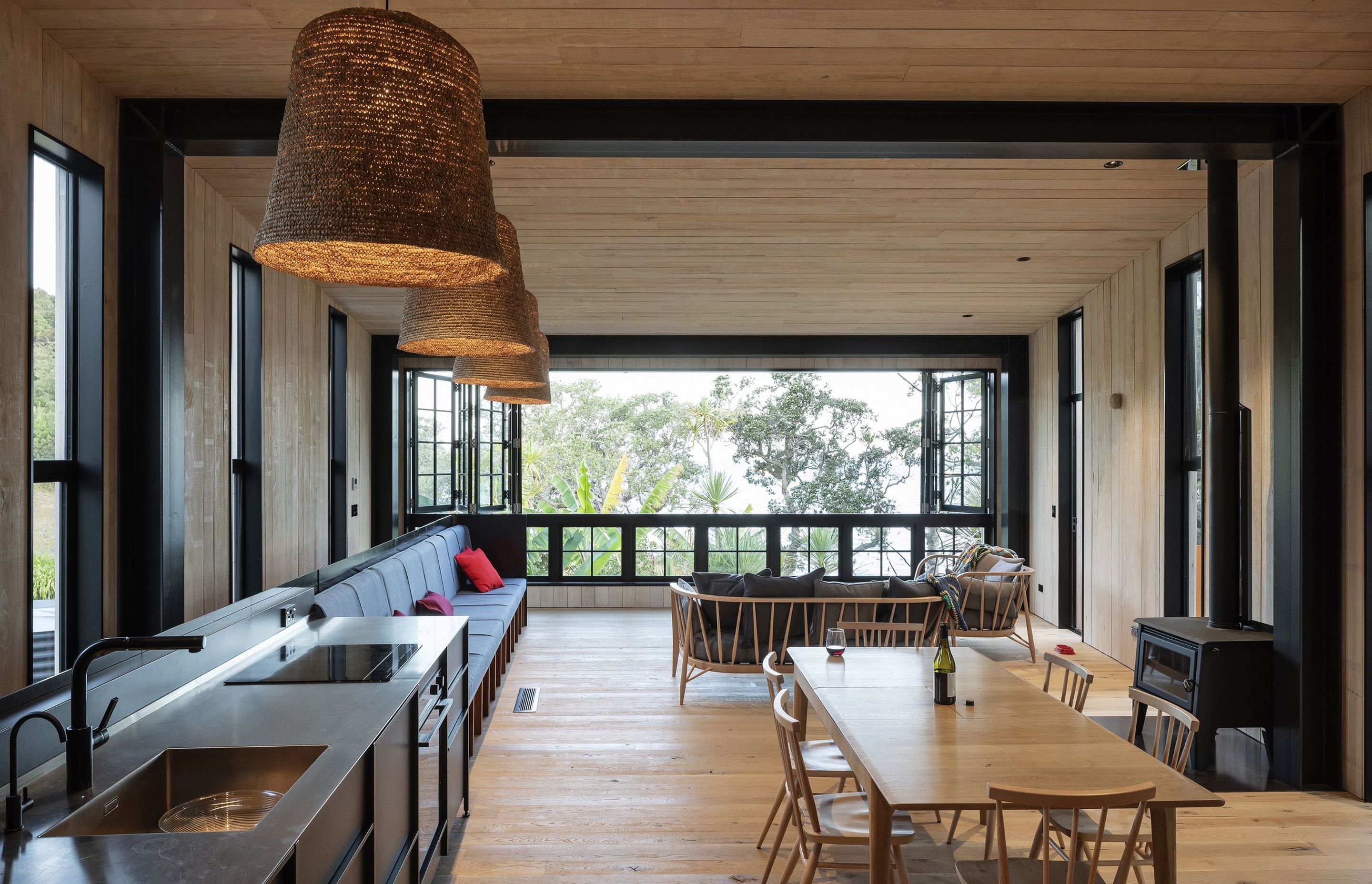 The home is entirely clad in cedar, which extends to the interior.