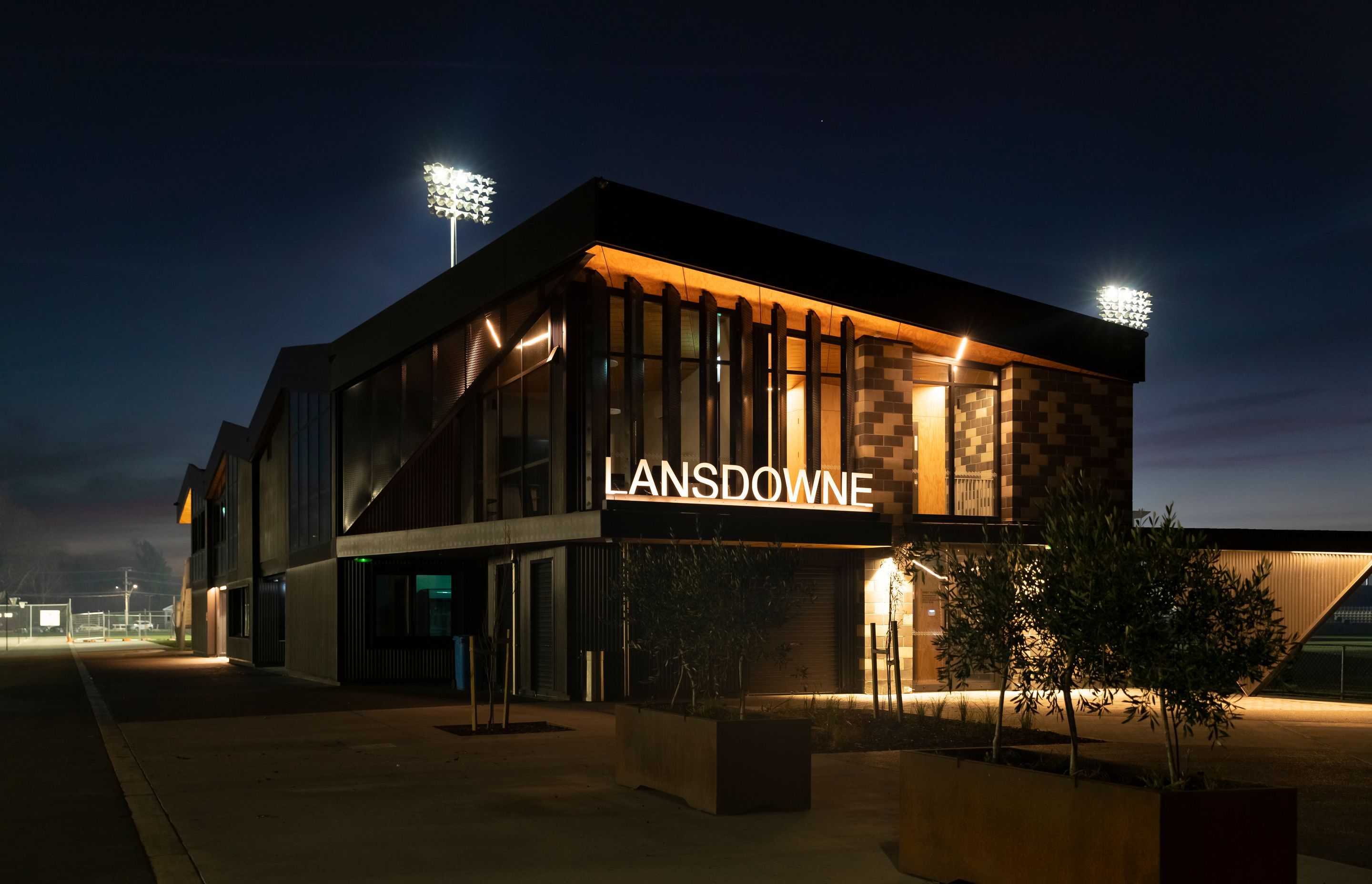 At night, the entrance to the building is lit up and sports can be easily viewed under the powerful floodlights.