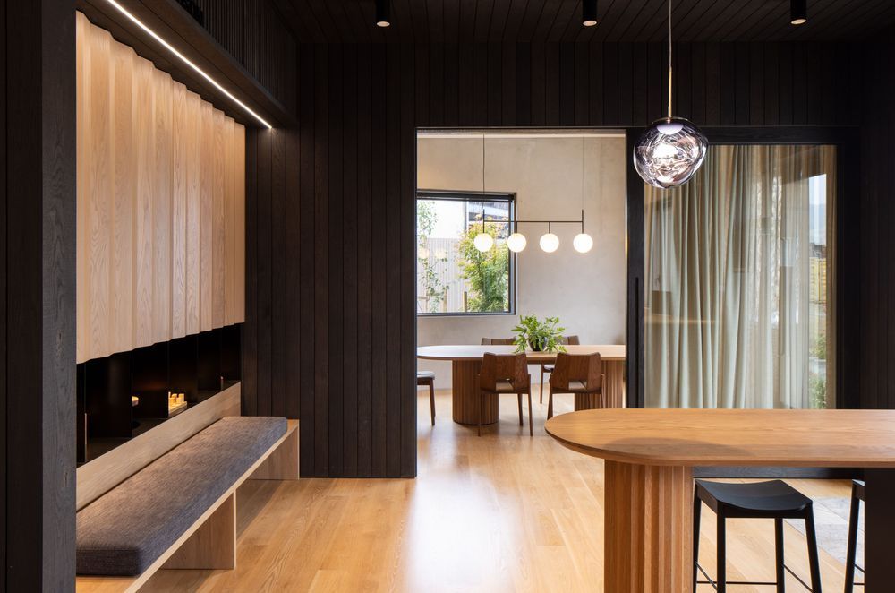 “We were quite careful about furniture that was selected, to complement the custom designed pieces and the oak panelling.” The curtain fabric is James Dunlop and the Tom Dixon Melt pendant is from ECC.