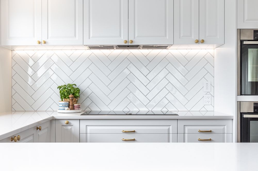 The kitchen is lit naturally by skylights.