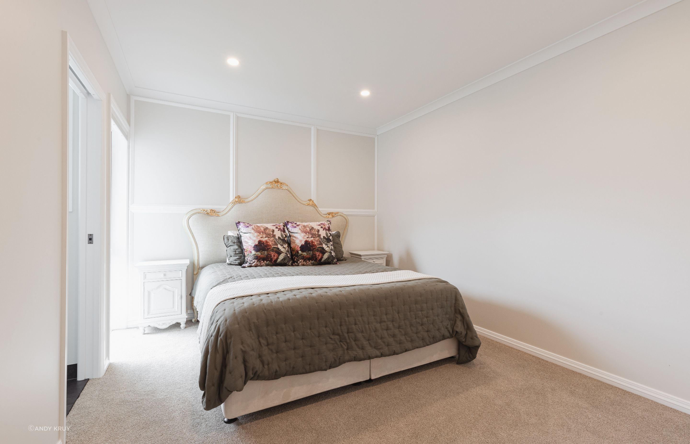 One of the five bedrooms, featuring bespoke panelling.