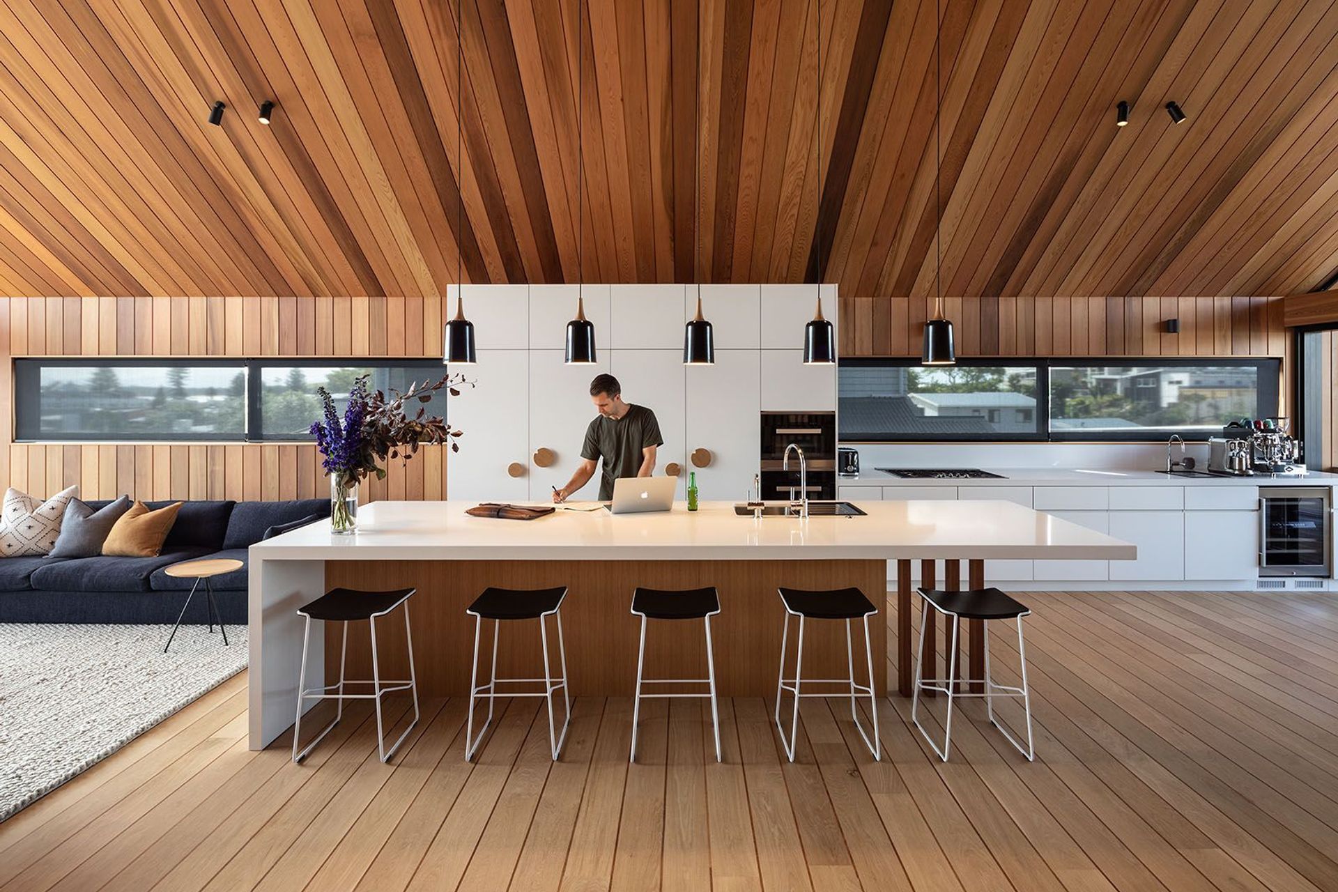 Free-flowing kitchen, dining, and living areas are ideal for entertaining.