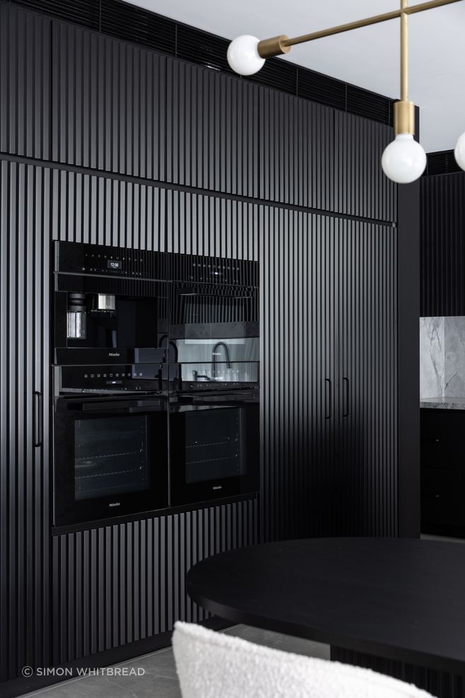 The cabinetry adds texture to the space.