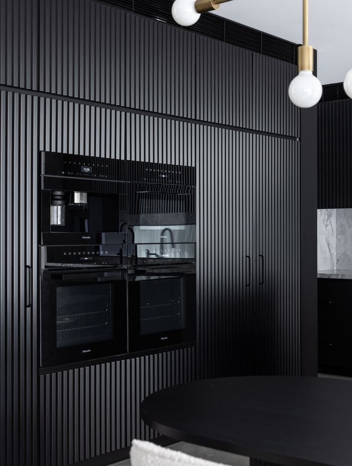 The cabinetry adds texture to the space.