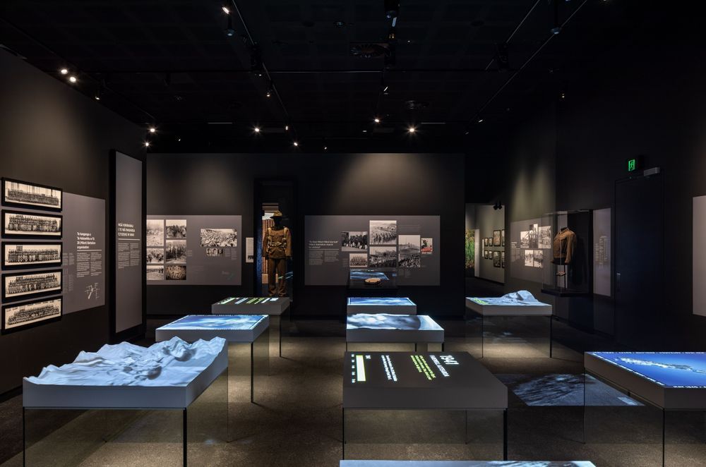 The main room of the museum is intentionally dark, in acknowledgement of the seriousness of the subject matter.