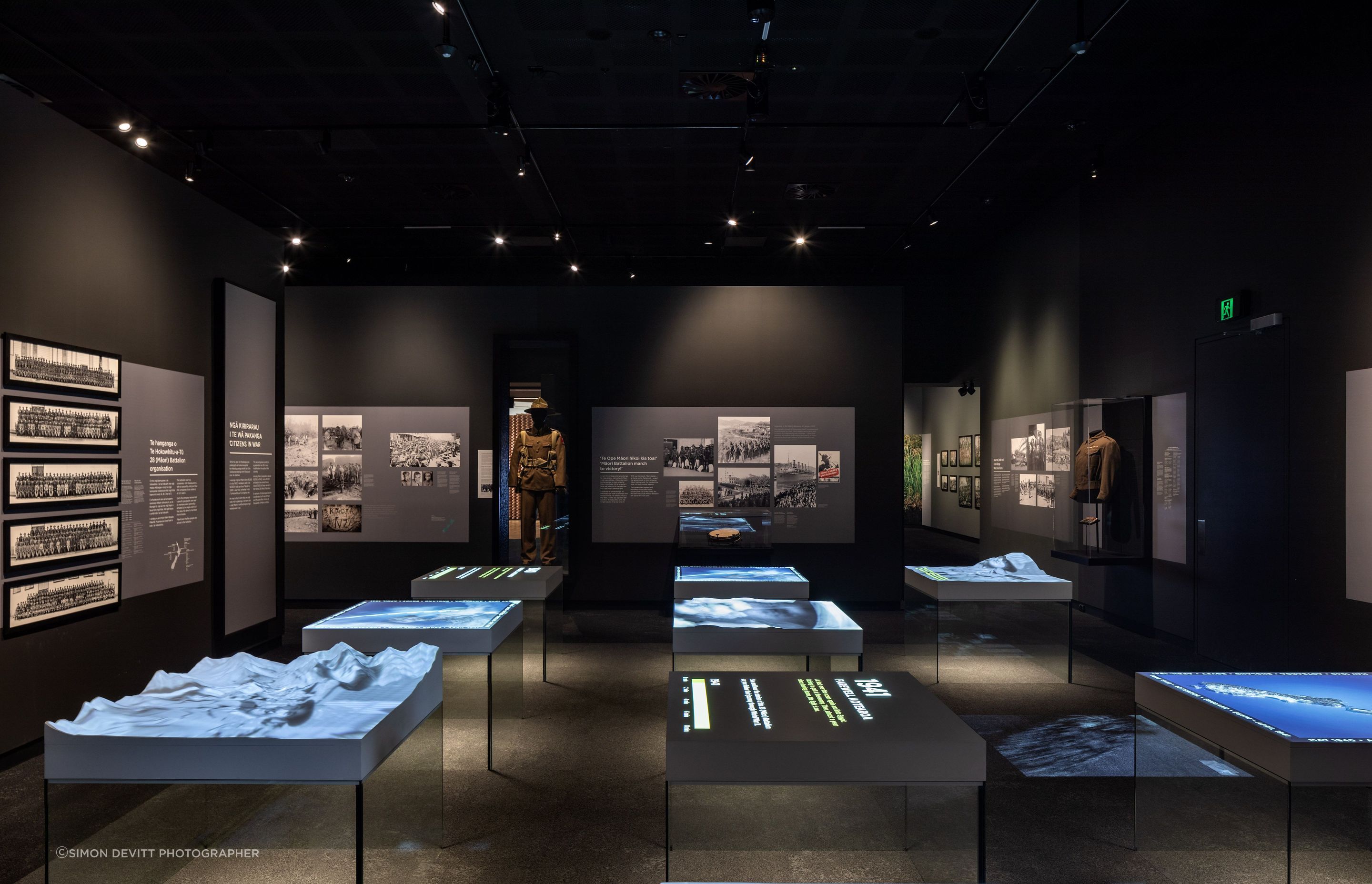 The main room of the museum is intentionally dark, in acknowledgement of the seriousness of the subject matter.