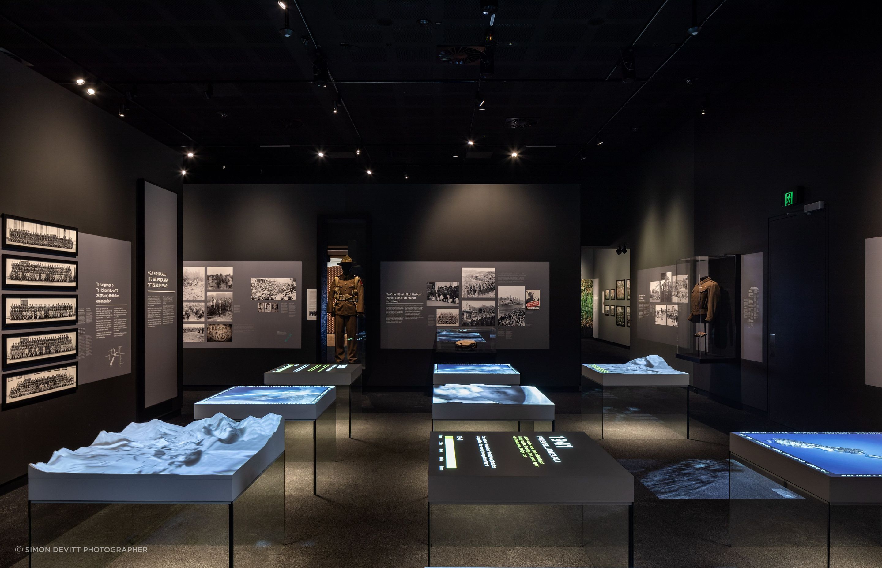 The main room of the museum is intentionally dark, in acknowledgement of the seriousness of the subject matter.