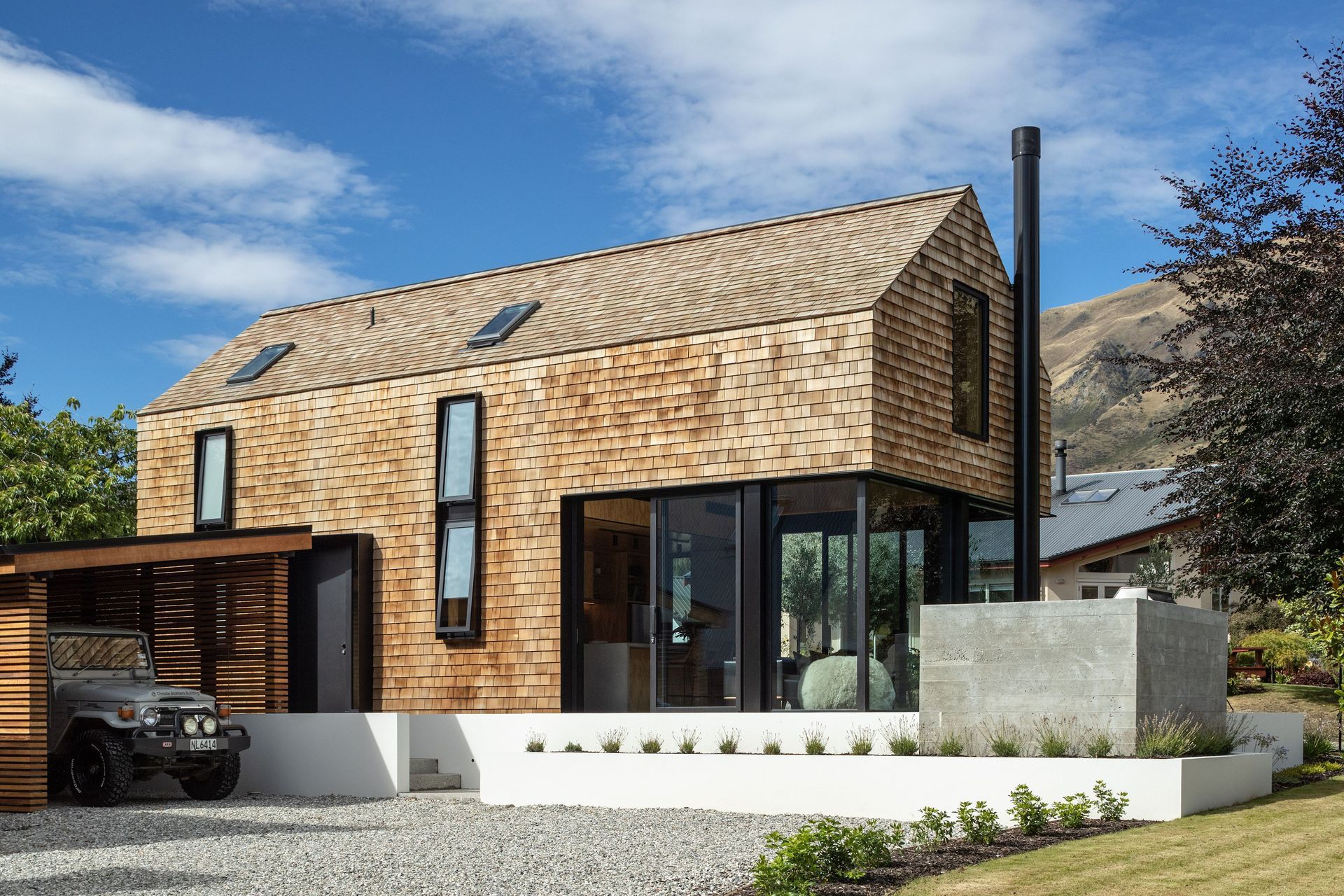 The cedar-shingled tiny house was built on a family-owned section in Wanaka, says Barry Condon of Condon Scott Architects. “The brief was for something that was compact that utilised the space as densely as possible. So I think we delivered on that front.”
