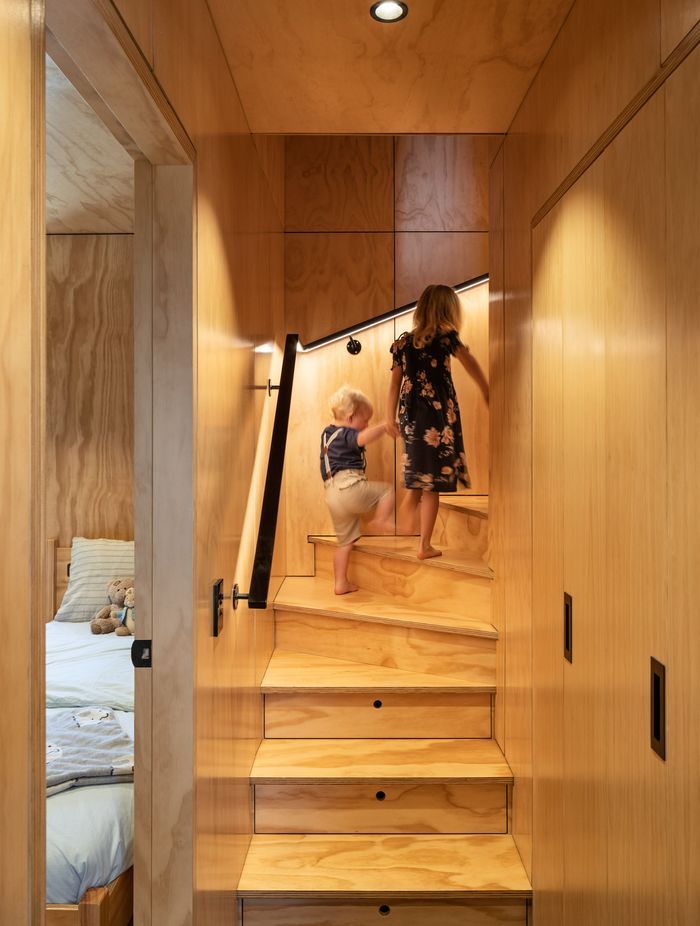 Efficient storage is crucial in a tiny home, says Barry. “We designed lots of little cubby holes. On the stairs we've got drawers that pull out from each step. The laundry has built-in storage racks. We’ve just tried to use every available centimetre of space that we could.”