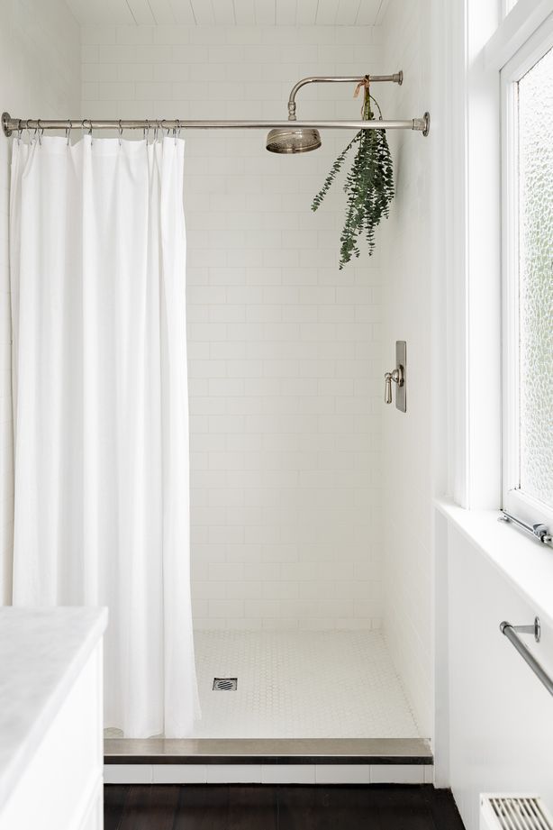 The same subway tiles used in the children's bathroom feature in the ensuite.