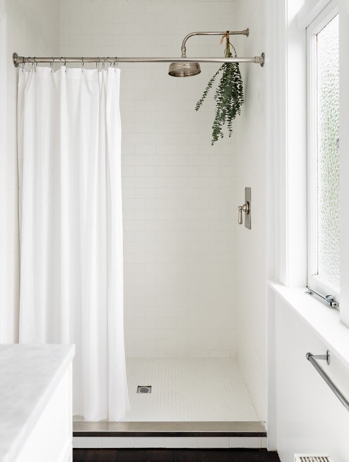 The same subway tiles used in the children's bathroom feature in the ensuite.