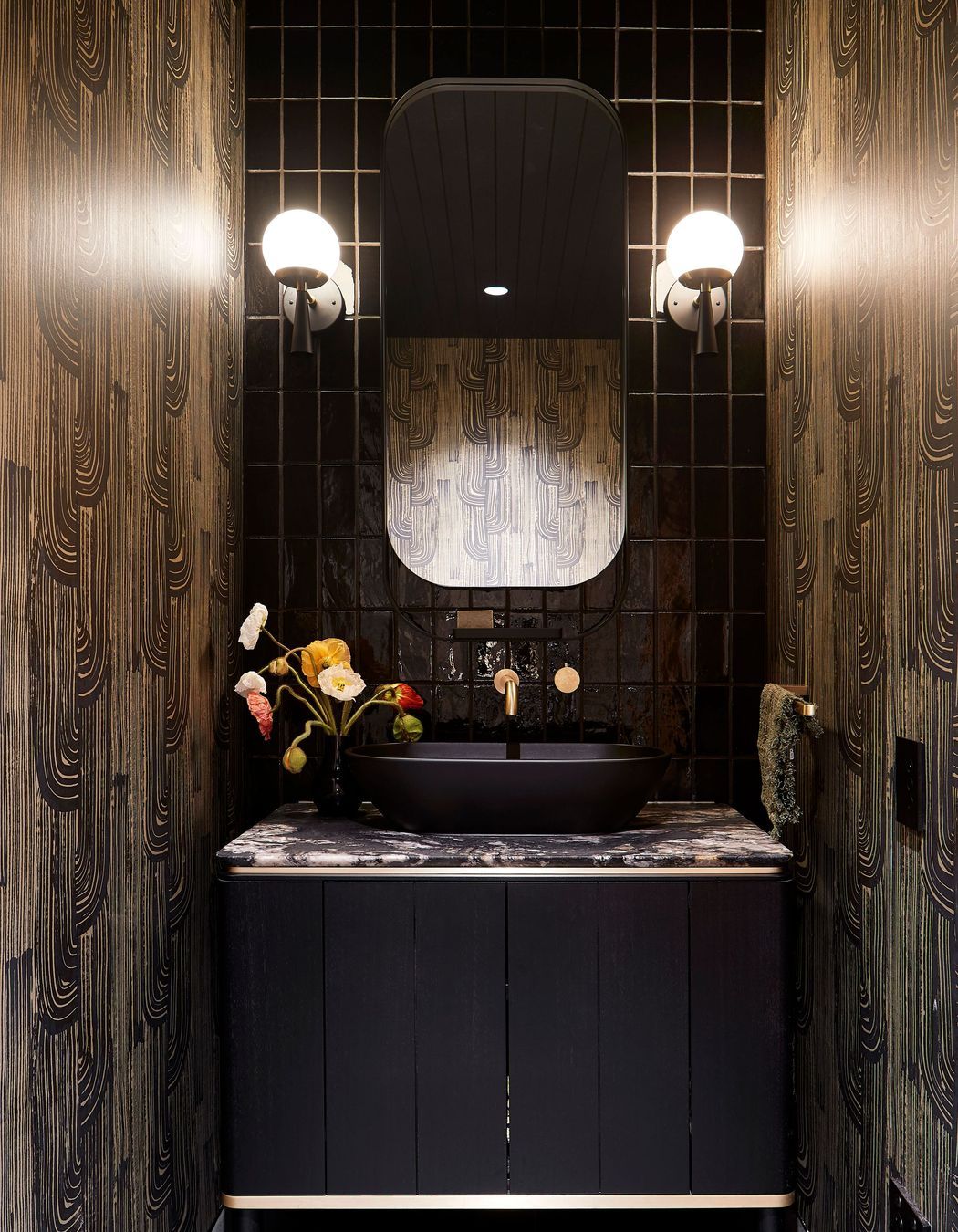 Beautiful mirror helps define the lighting | Photography by Shannon McGrath