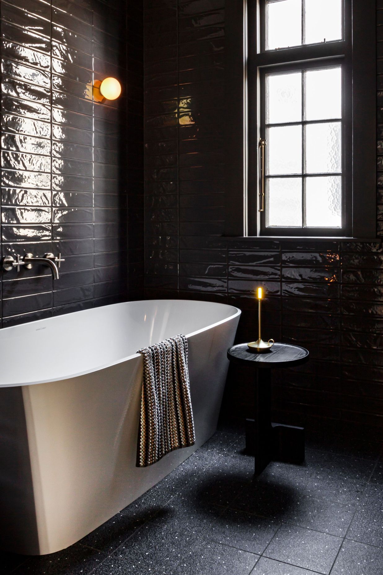 With small spaces it is actually better to play up the darkness, says Rose Schwarz of Schwarz Design. “It becomes a place of surrounding, evoking rest and relaxation.”