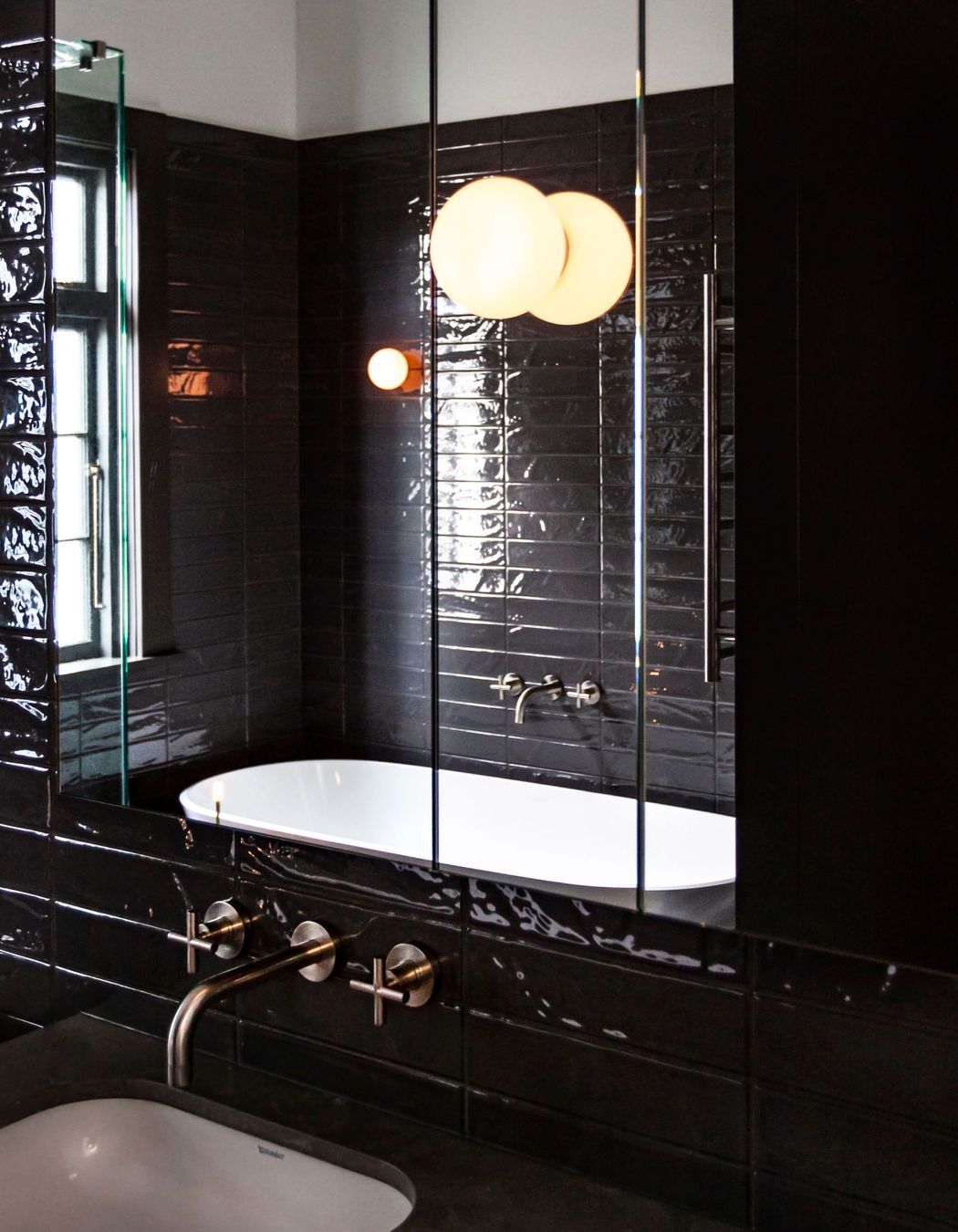 “The brushed nickel in the tapware is beautiful because it does pick up tones around it,” says Juliette Schwarz. “It's not too trendy either.”