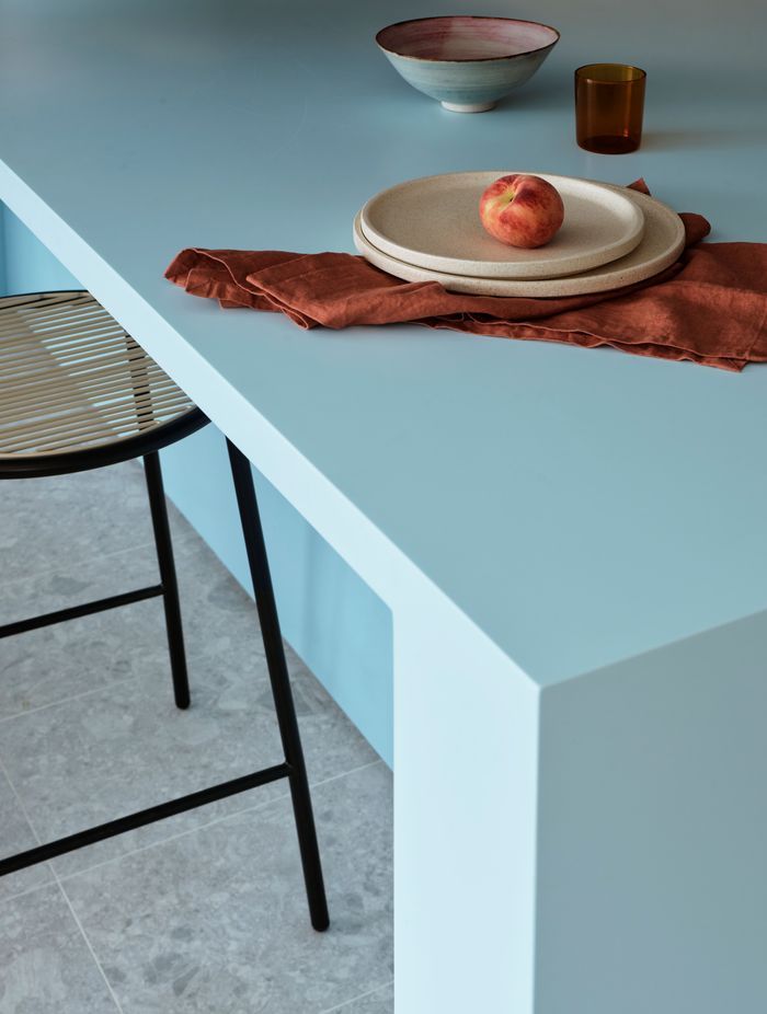 The huge blue Marblo kitchen island is perfect for hosting all the staff.