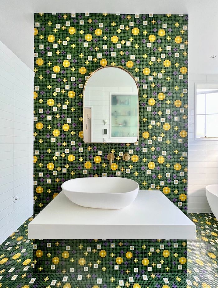 The mirror is from Tessuti, says homeowner Maria Konings, and all other fittings are from Plumbline.