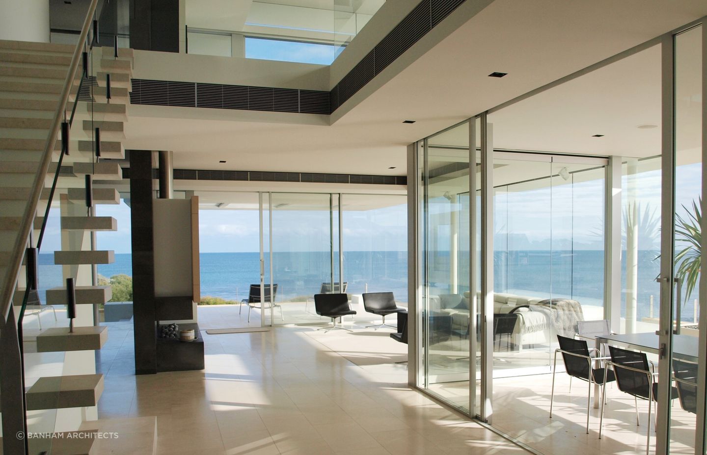The open-plan design of the living space provides a sumptuous setting to enjoy the ocean views. Photography: Annetta Ashman.