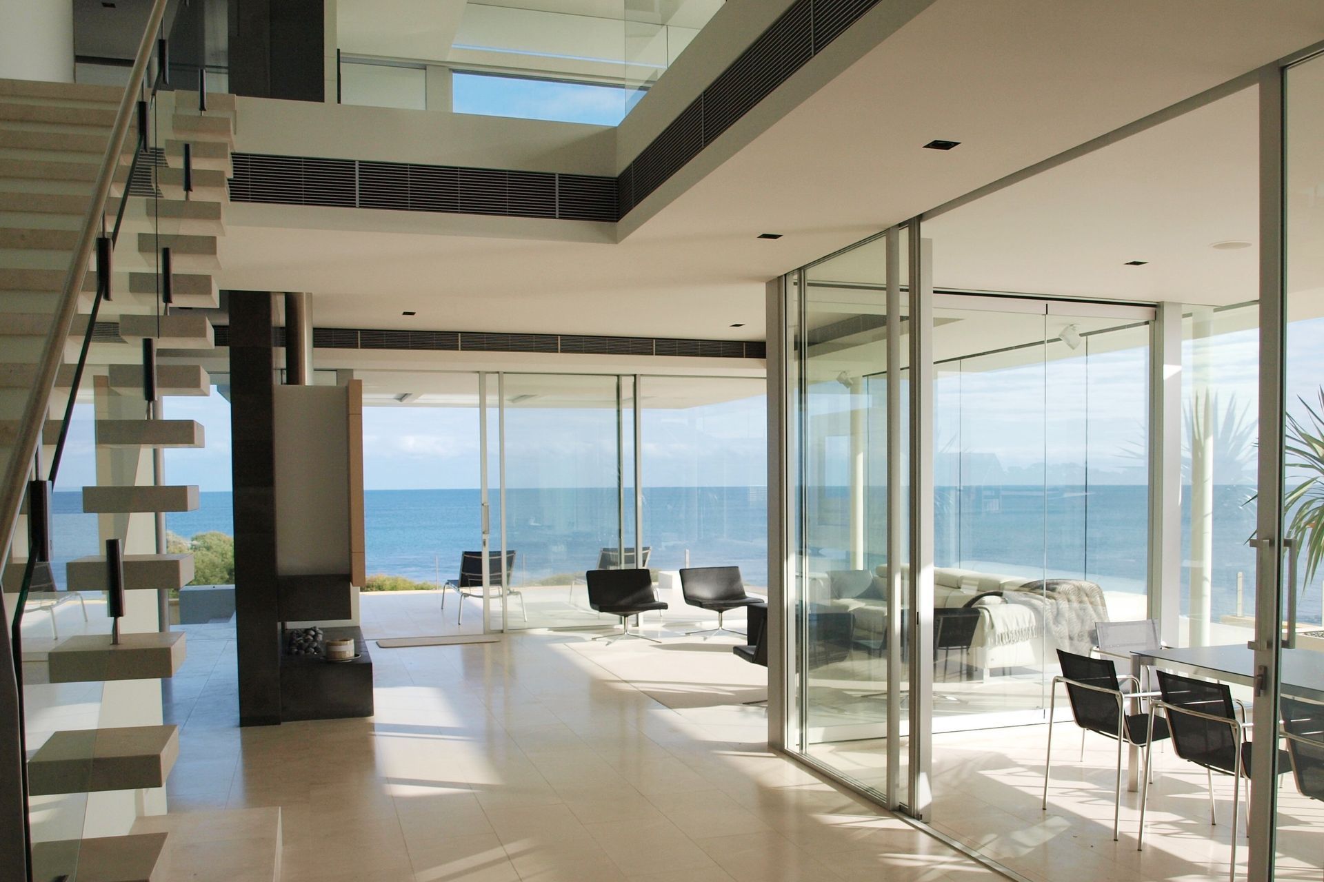 The open-plan design of the living space provides a sumptuous setting to enjoy the ocean views. Photography: Annetta Ashman.