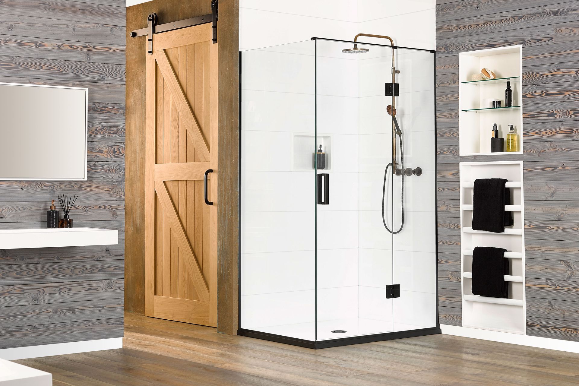 It's easy to spend time in a shower like the Black Pearl, complemented by Ellure Tile Look Walls.