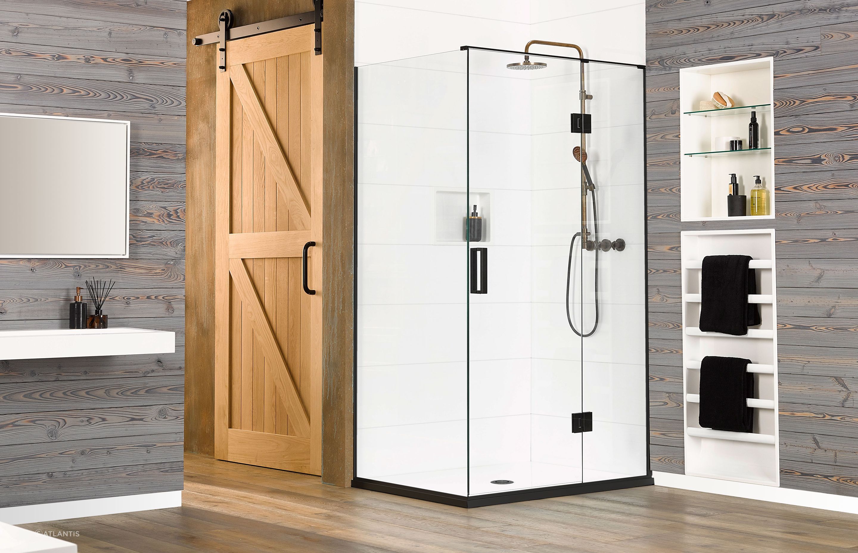 It's easy to spend time in a shower like the Black Pearl, complemented by Ellure Tile Look Walls.