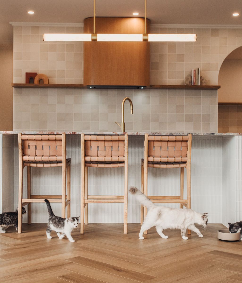 A delightfully clever timber-look acoustic floor that effortlessly handles the chaos of family life