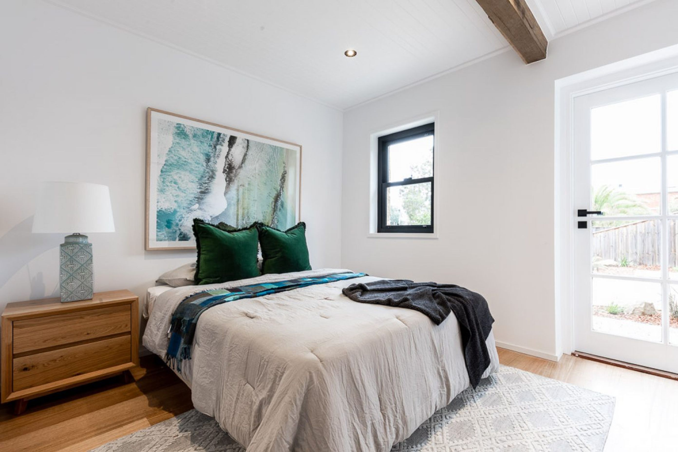 The existing timber beams have been retained in all of the bedrooms.