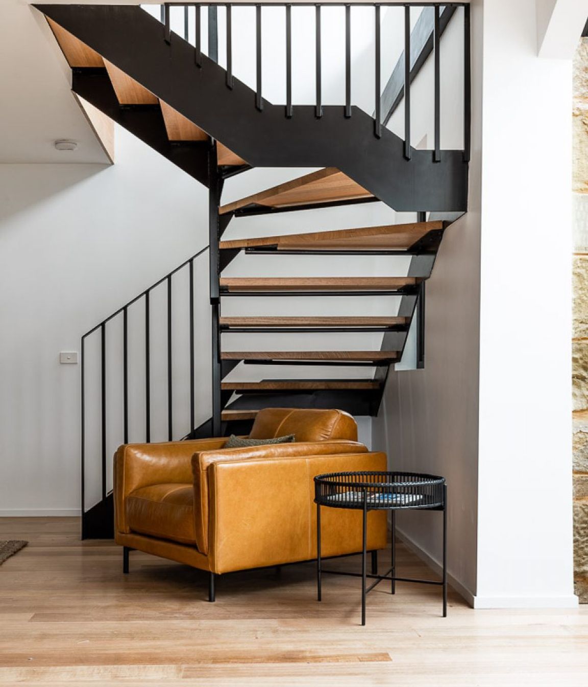 The stairs were redesigned to one day accommodate a grand piano.