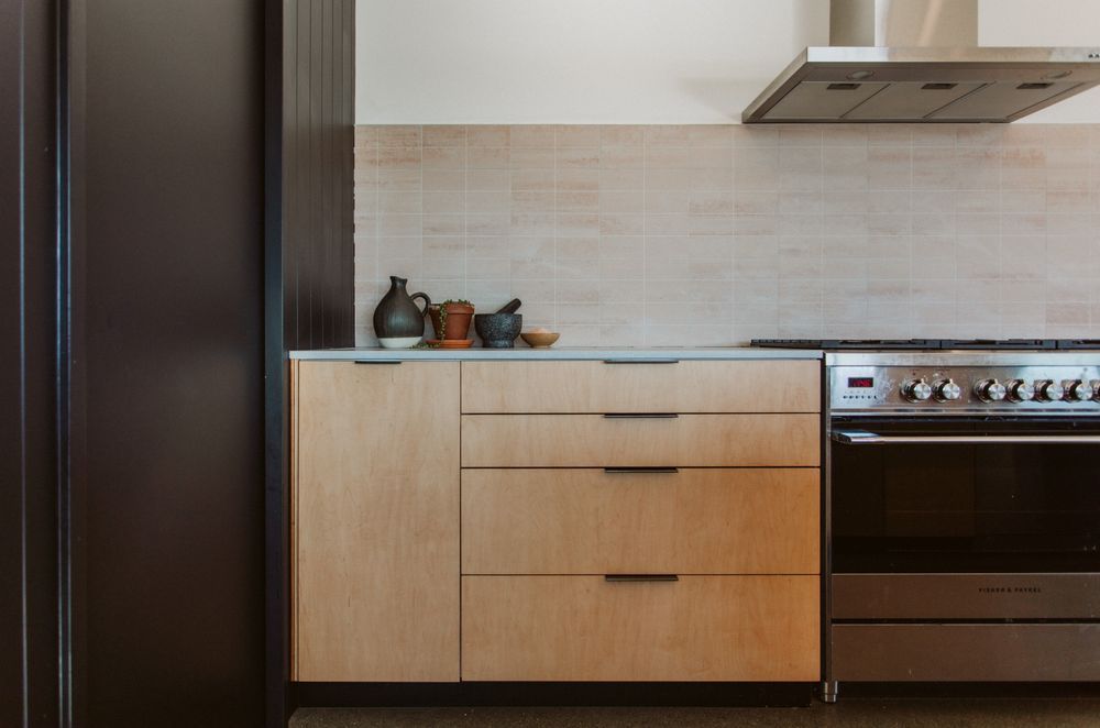 A soft natural palette is adopted in the kitchen.