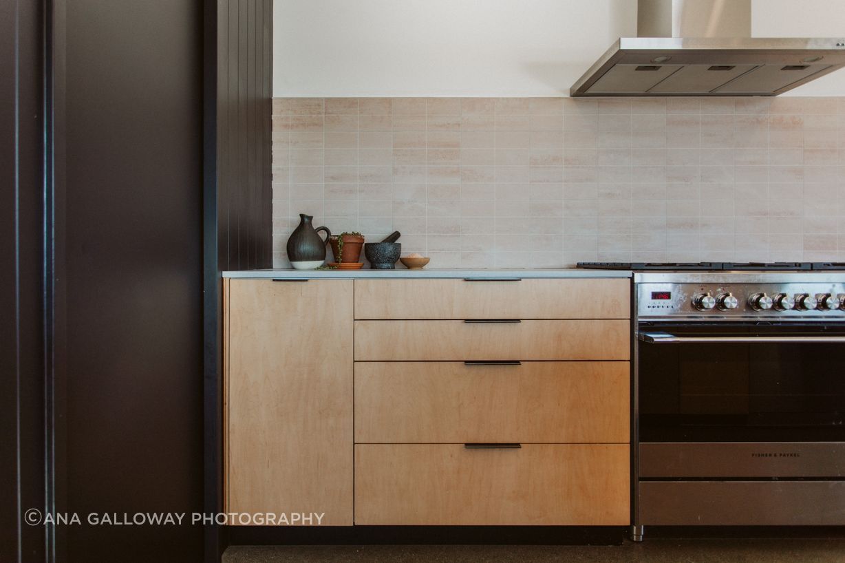 A soft natural palette is adopted in the kitchen.