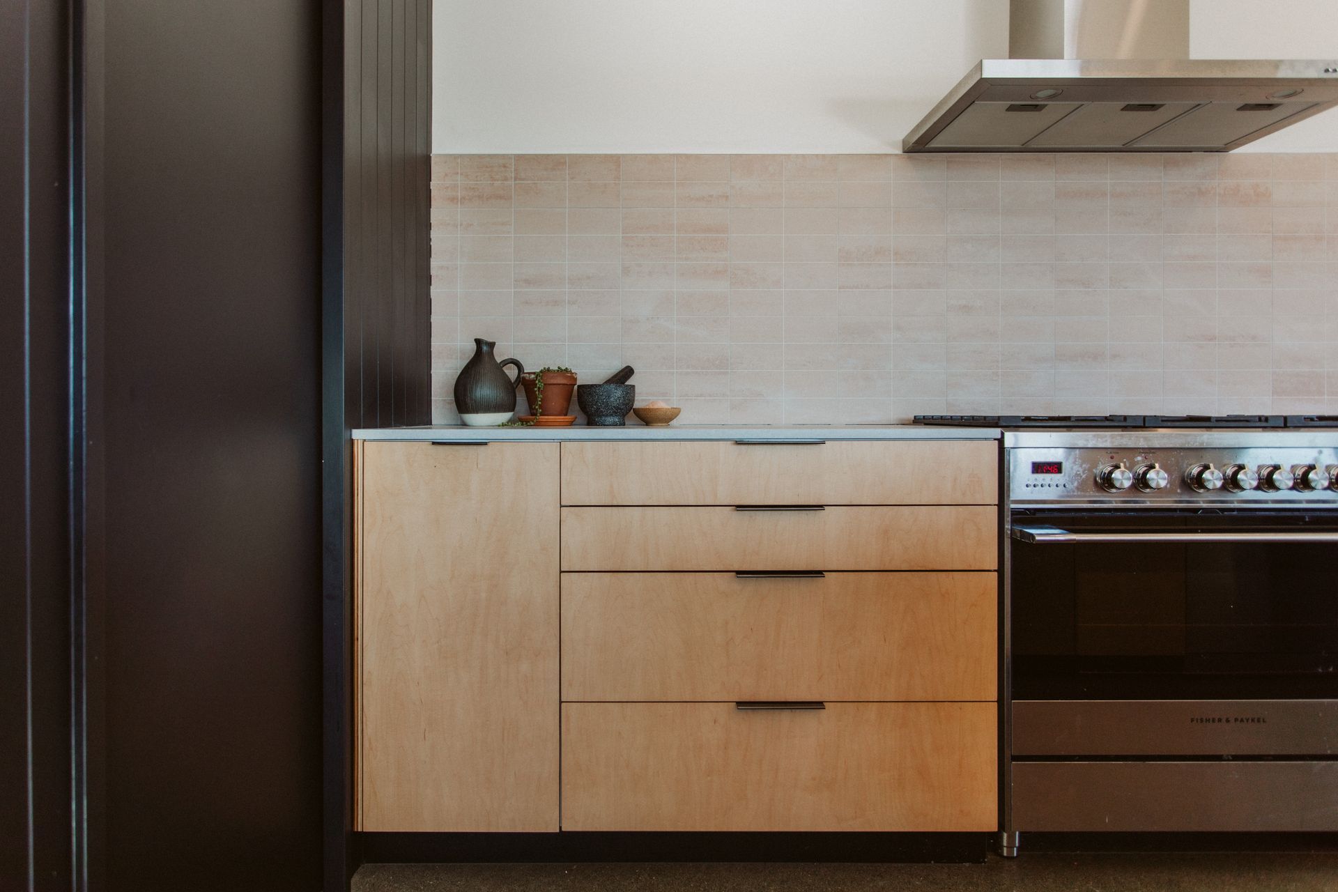 A soft natural palette is adopted in the kitchen.