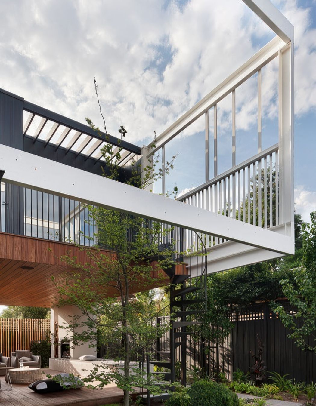 Stepping House features a secret side entry and a romantic spiral stair to take young adults to their retreat which includes bedrooms with ensuites, a rumpus that is now young adults lounge and a balcony of their own.