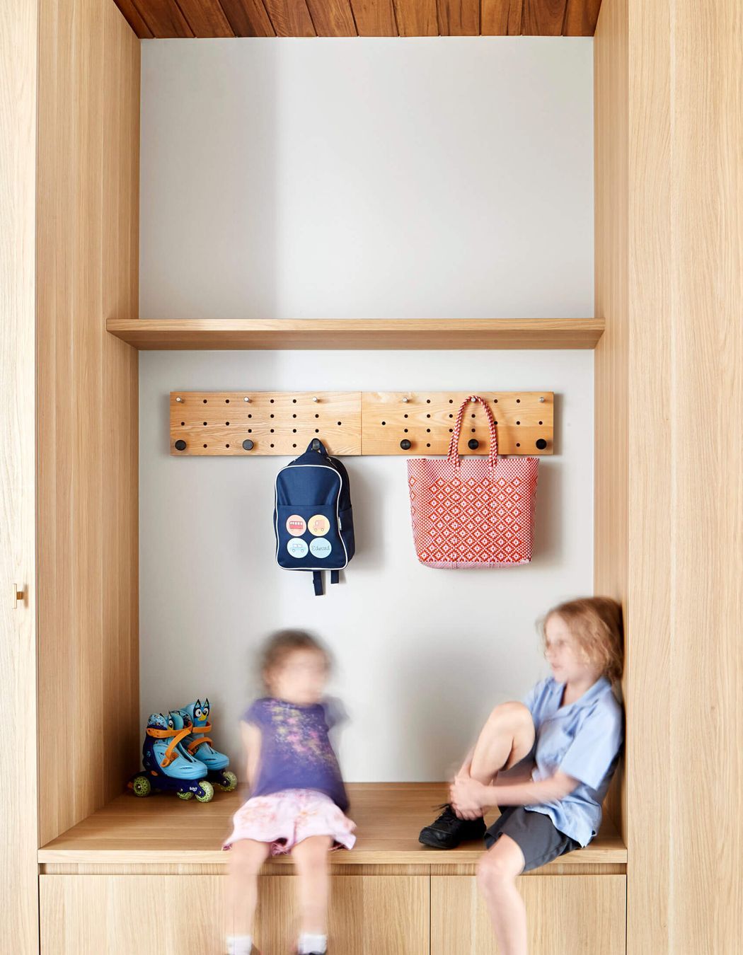 The mud room at the Long Garden House has storage for bags, shoes, sports gear and coats.