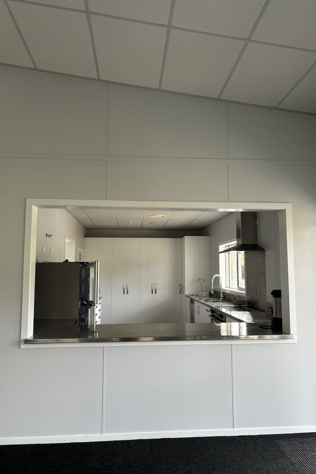 “We actually developed a custom colour, Elim Grey, for the project. This light grey provides a neutral backdrop that complements the function and use of various spaces, including child care rooms, an auditorium, and a commercial kitchen."
