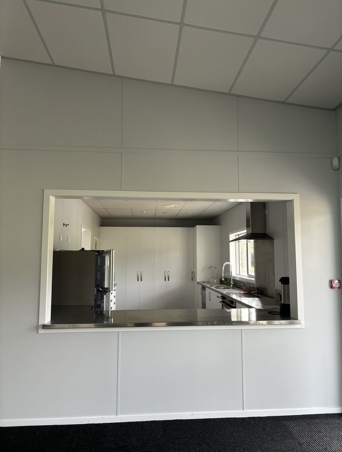 “We actually developed a custom colour, Elim Grey, for the project. This light grey provides a neutral backdrop that complements the function and use of various spaces, including child care rooms, an auditorium, and a commercial kitchen."