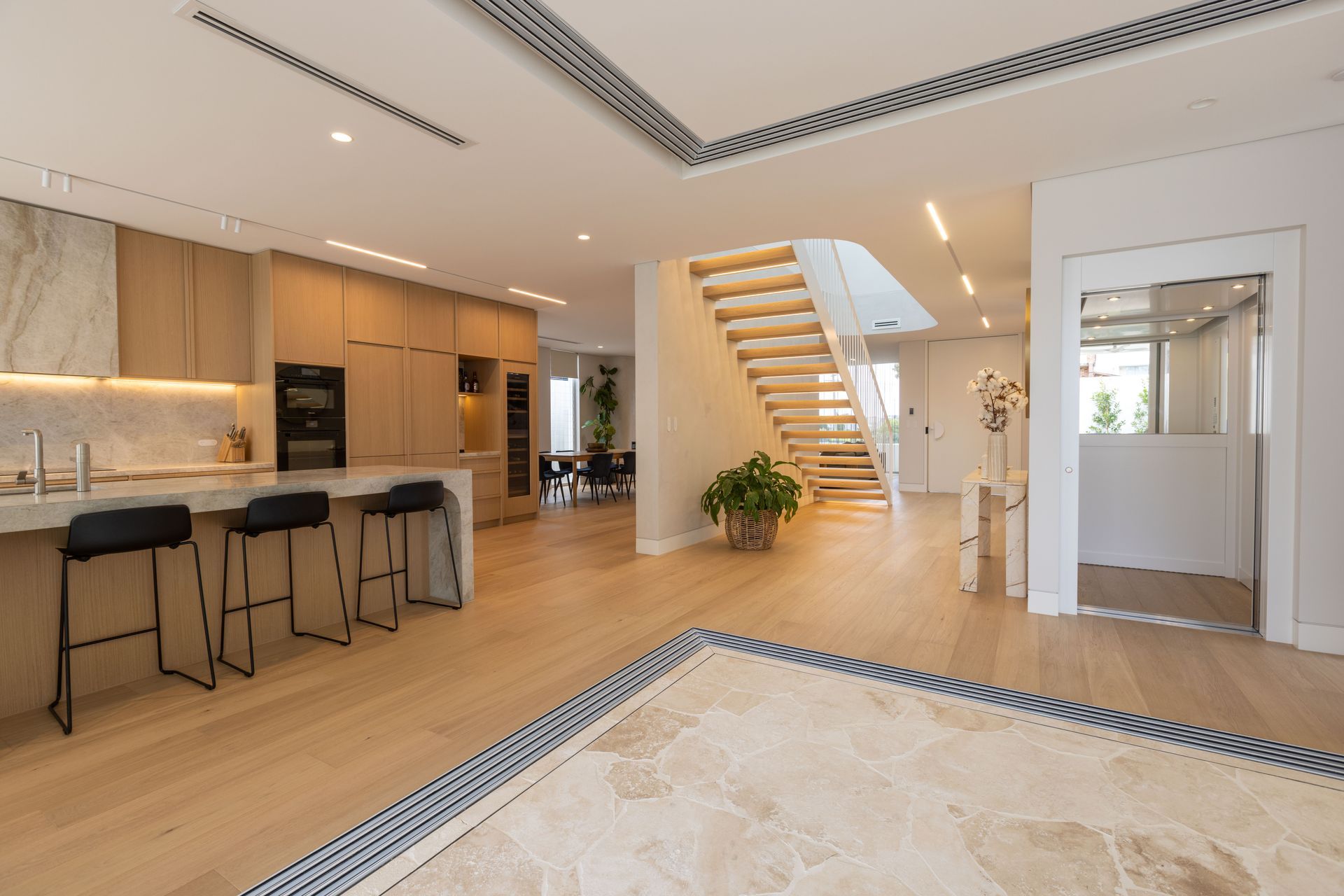 A lift connects the three levels of the home.