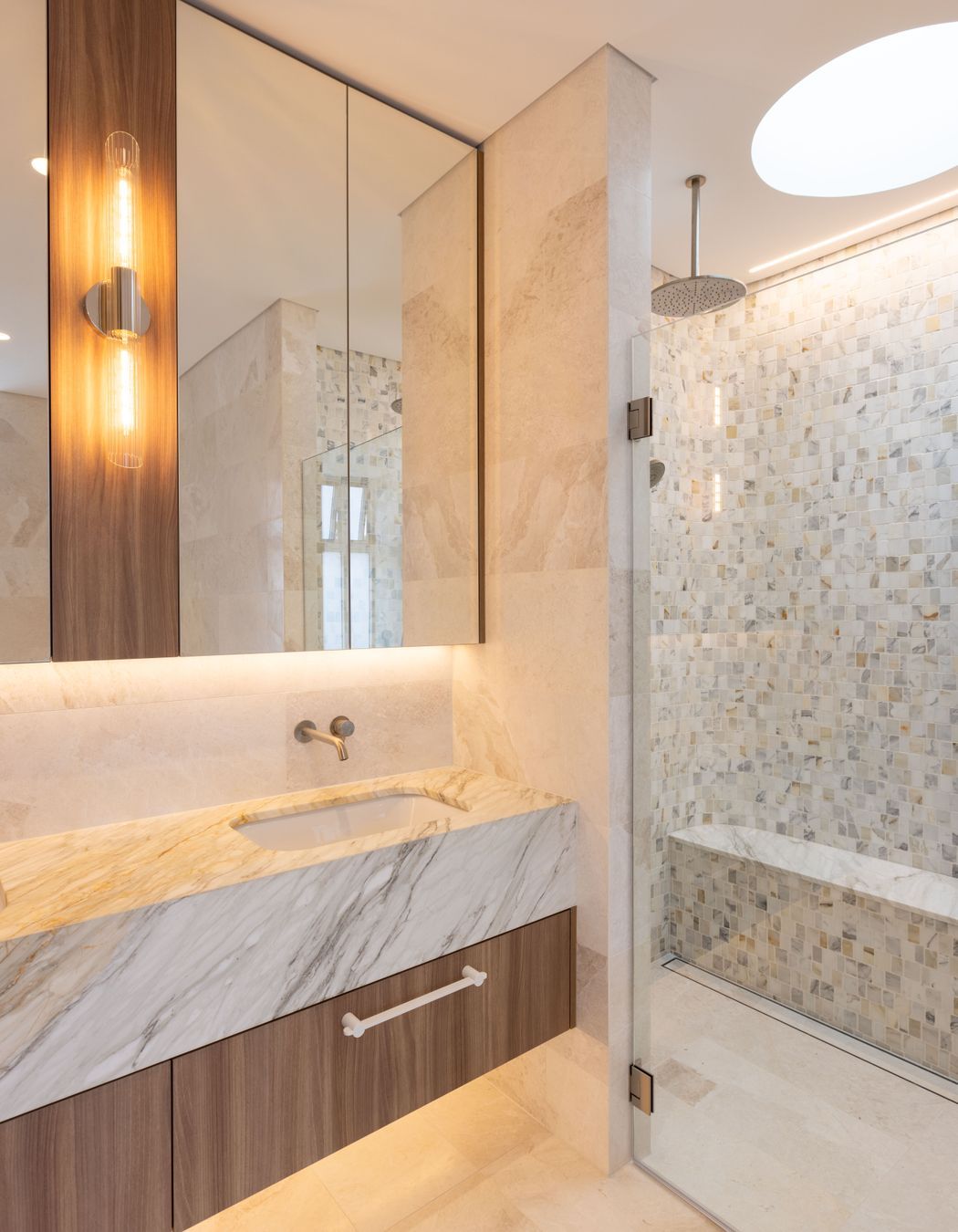 Natural tones, textures and shapes continue throughout this architectural home.