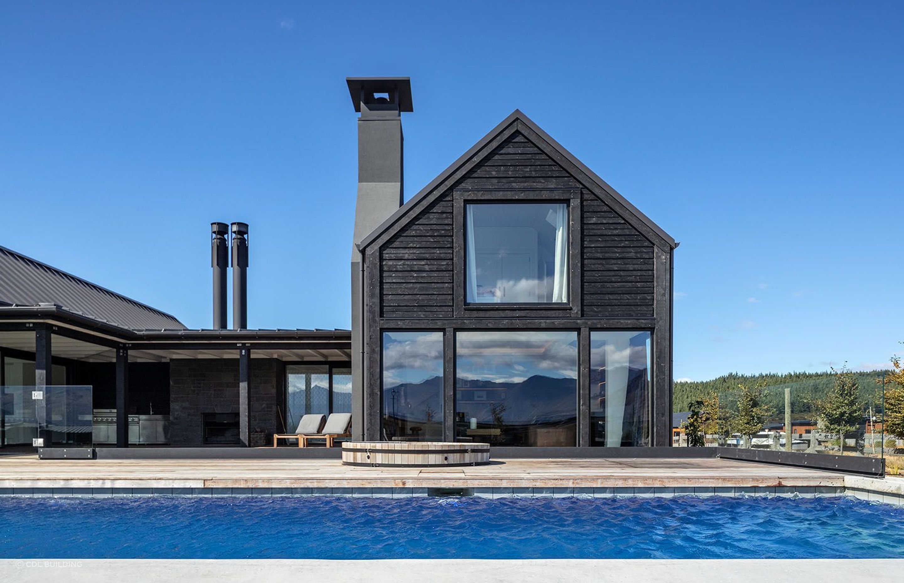 Burnt larch weatherboards are just one of the fine features of Mt Gold House in Wanaka. | Photography: Simon Devitt