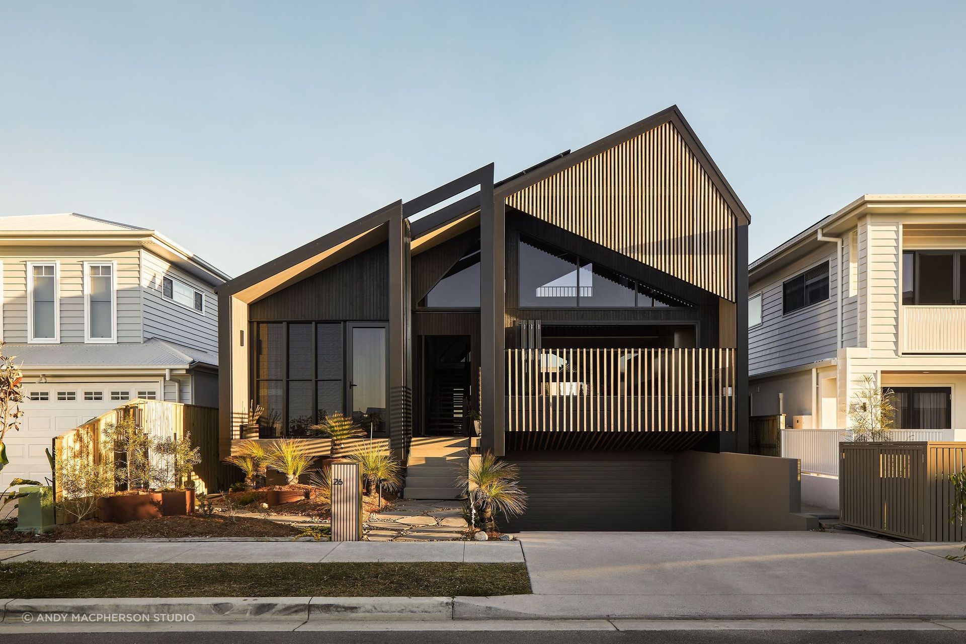 Faced with a limited 375sqm site and the desire to realise three bedrooms and living space on the ground floor, the owners wished to explore the concept of creating generosity of space through vertical volumes of double-height spaces and exaggerate the feeling of openness and allow opportunities for light and ventilation.