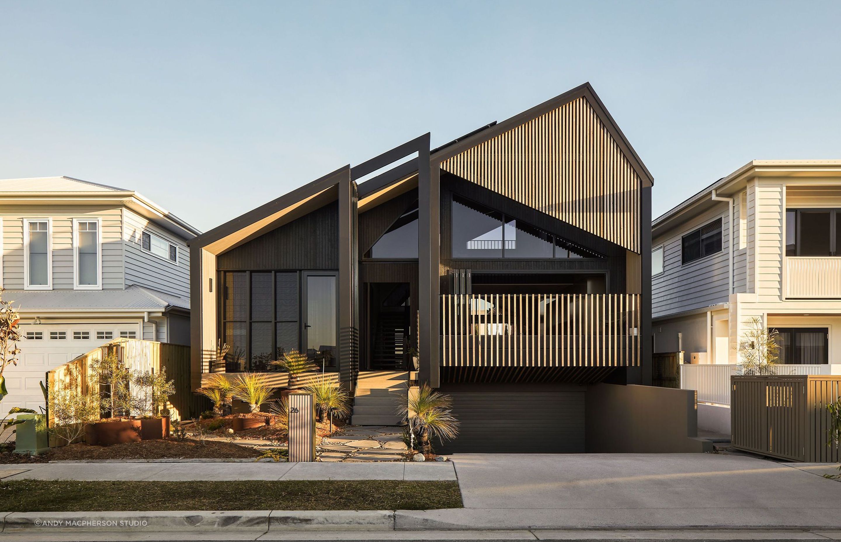 Faced with a limited 375sqm site and the desire to realise three bedrooms and living space on the ground floor, the owners wished to explore the concept of creating generosity of space through vertical volumes of double-height spaces and exaggerate the feeling of openness and allow opportunities for light and ventilation.