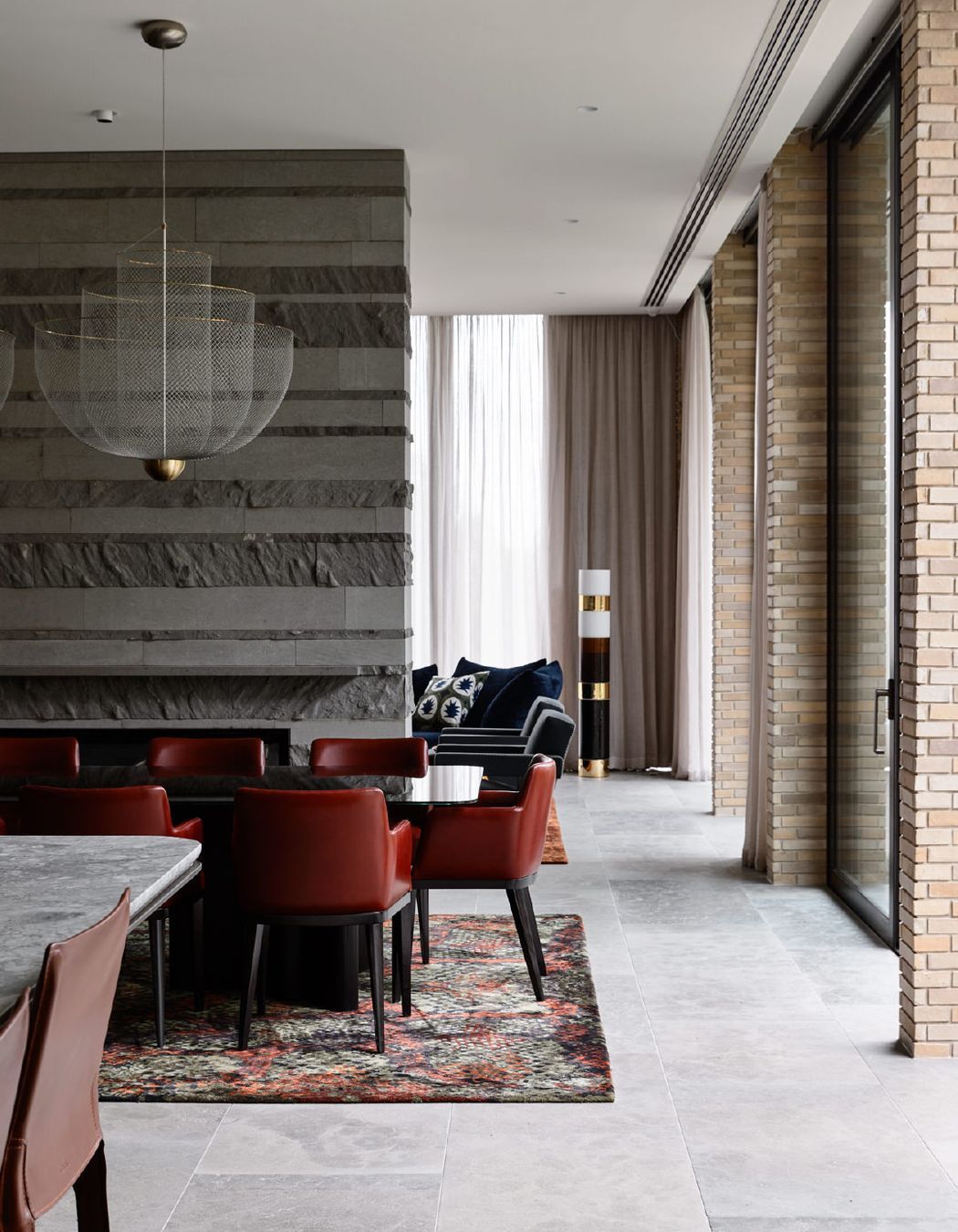 Rich materiality lends a feminine touch to this Brutalist entertainers’ paradise