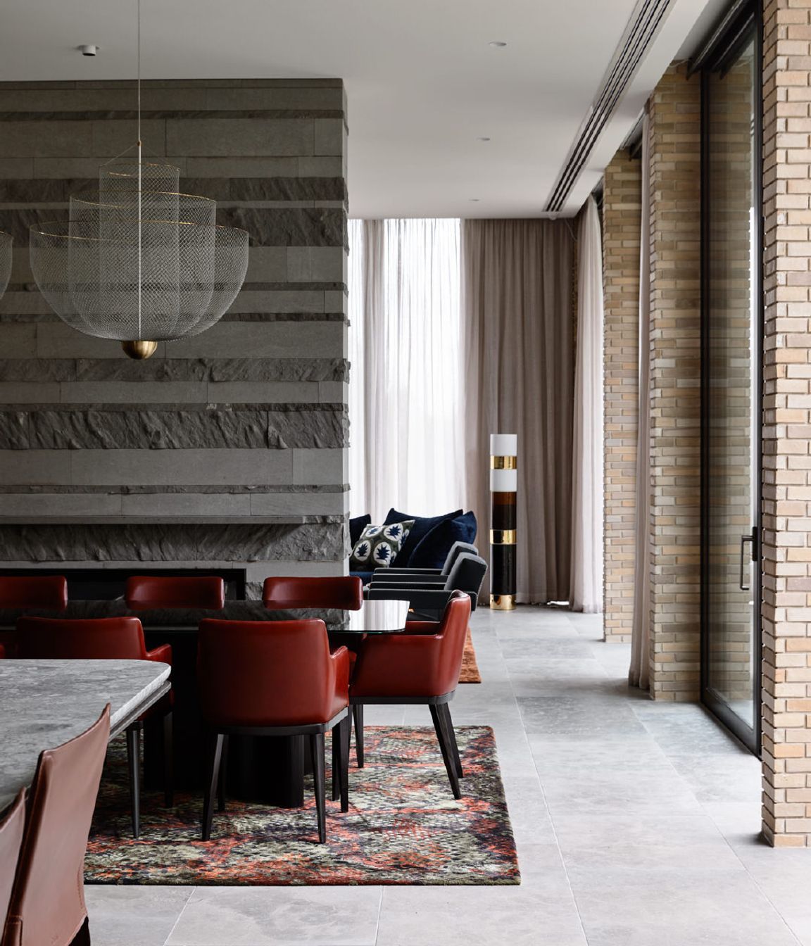 Rich materiality lends a feminine touch to this Brutalist entertainers’ paradise
