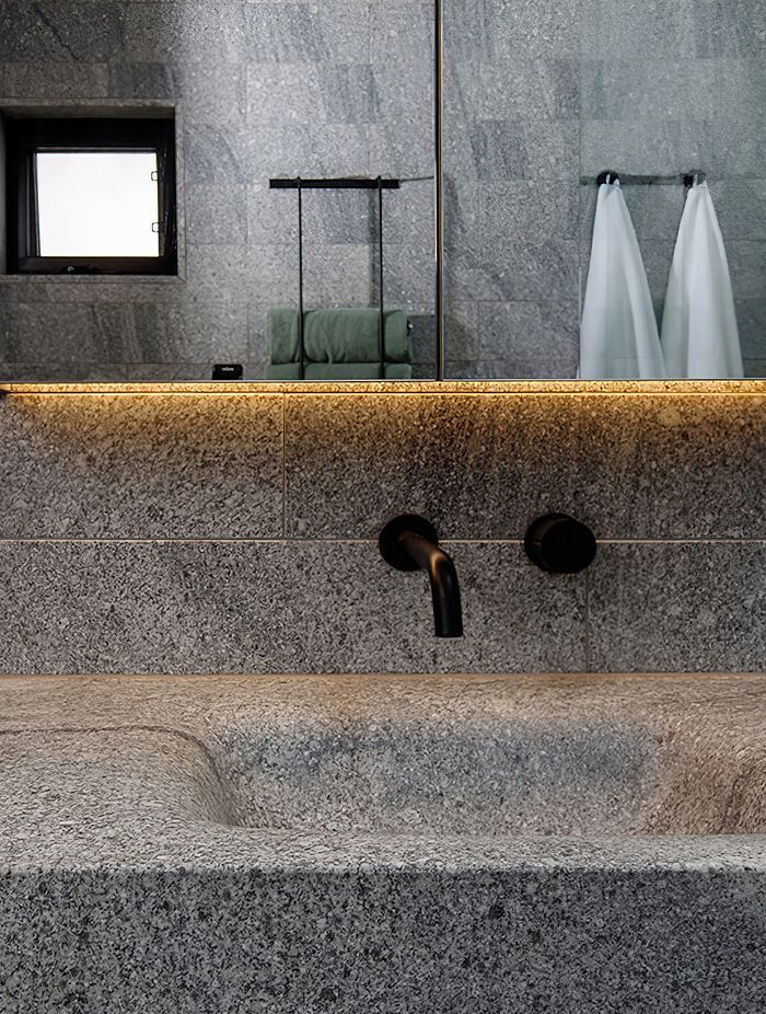 Granite Works installed floating stone basins; weighing over 300kg.