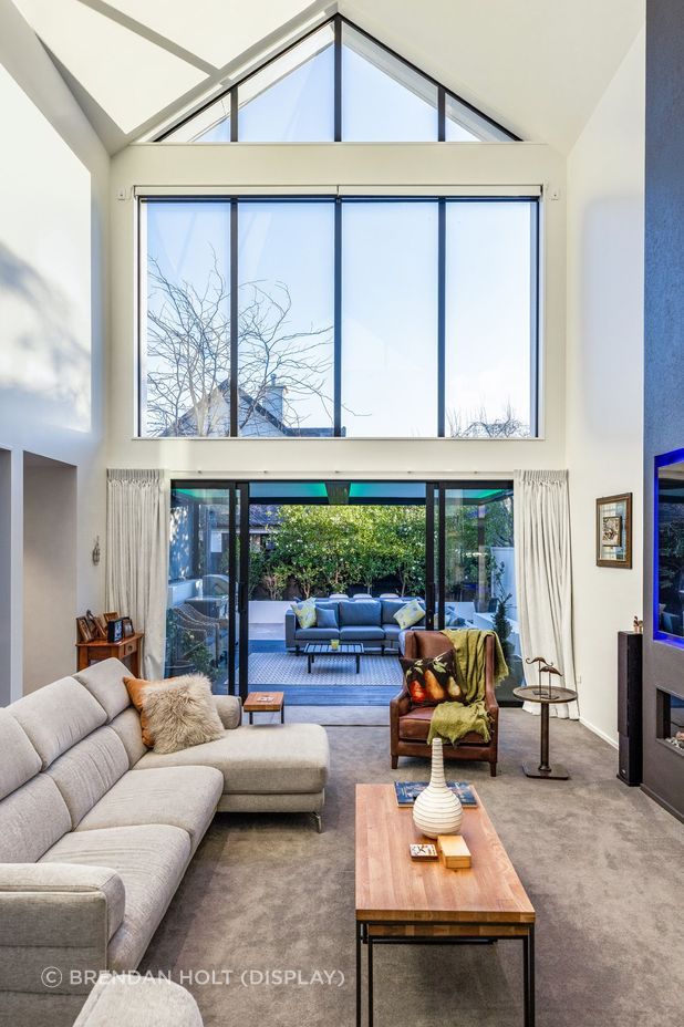 Plenty of natural light enters the main living area through the extensive glazing.