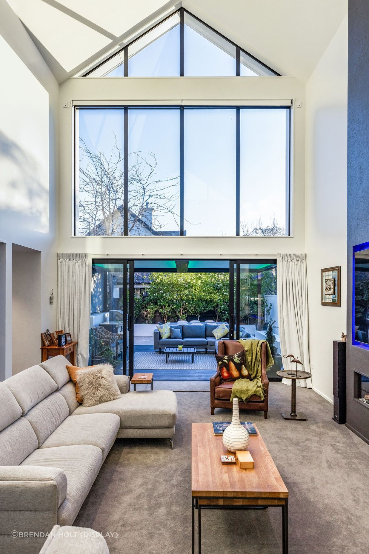 Plenty of natural light enters the main living area through the extensive glazing.