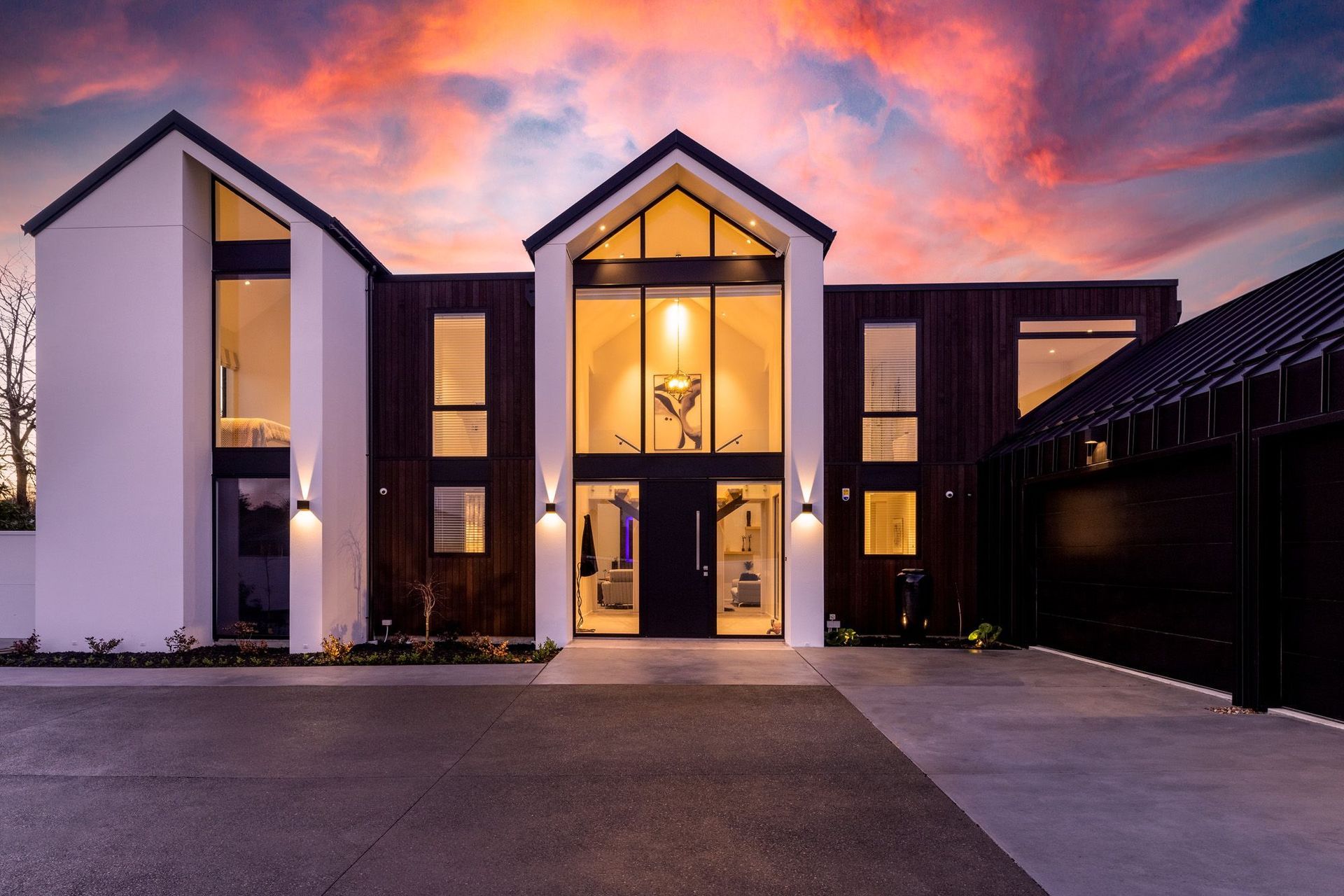 Guests are greeted by a grand entrance at this home on Regents Park Drive, designed by Choice Architecture.