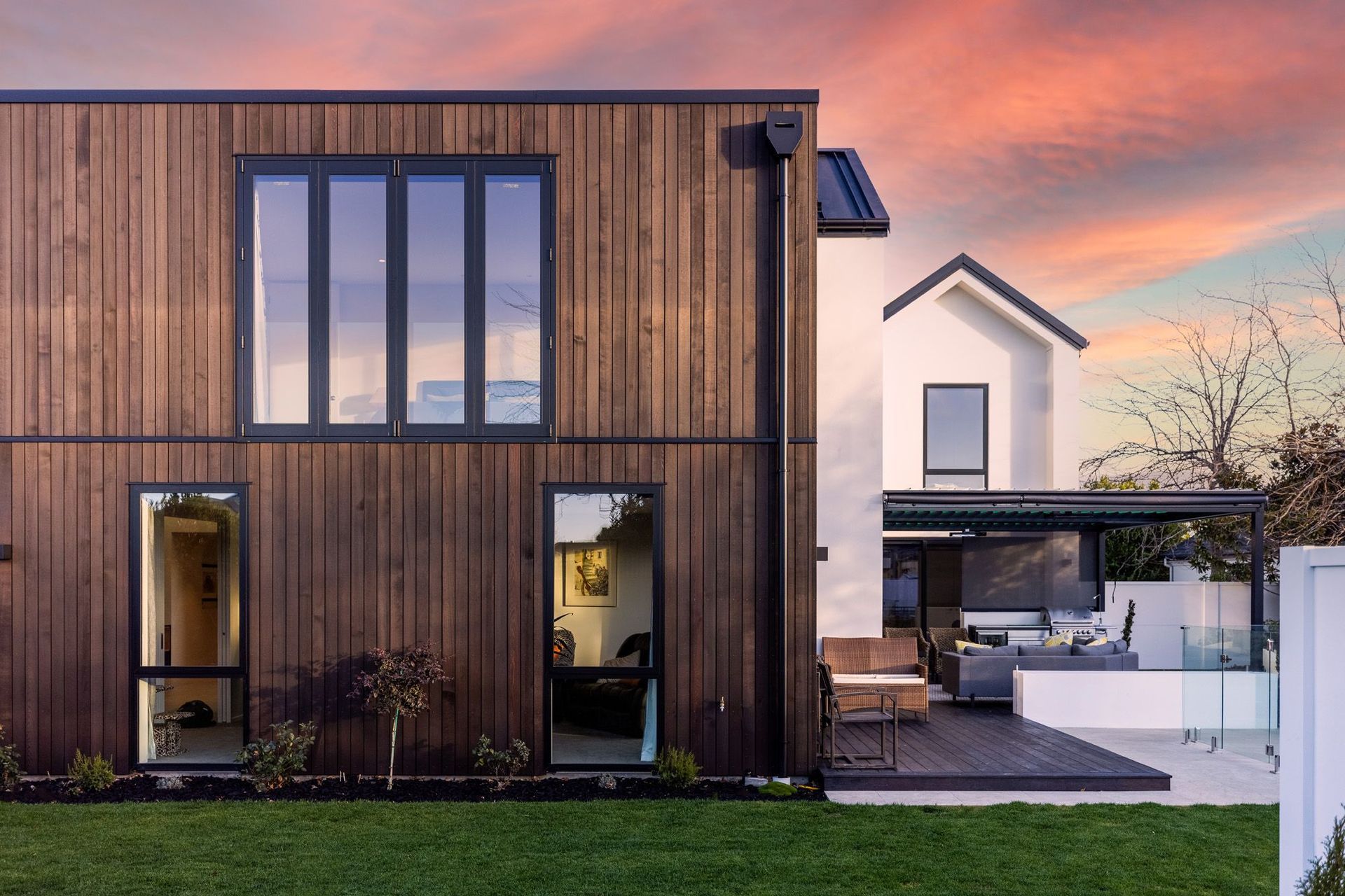 The exterior of the house is a contrast of colours and materials, including AAC panel, cedar and Colorsteel Eurotray.